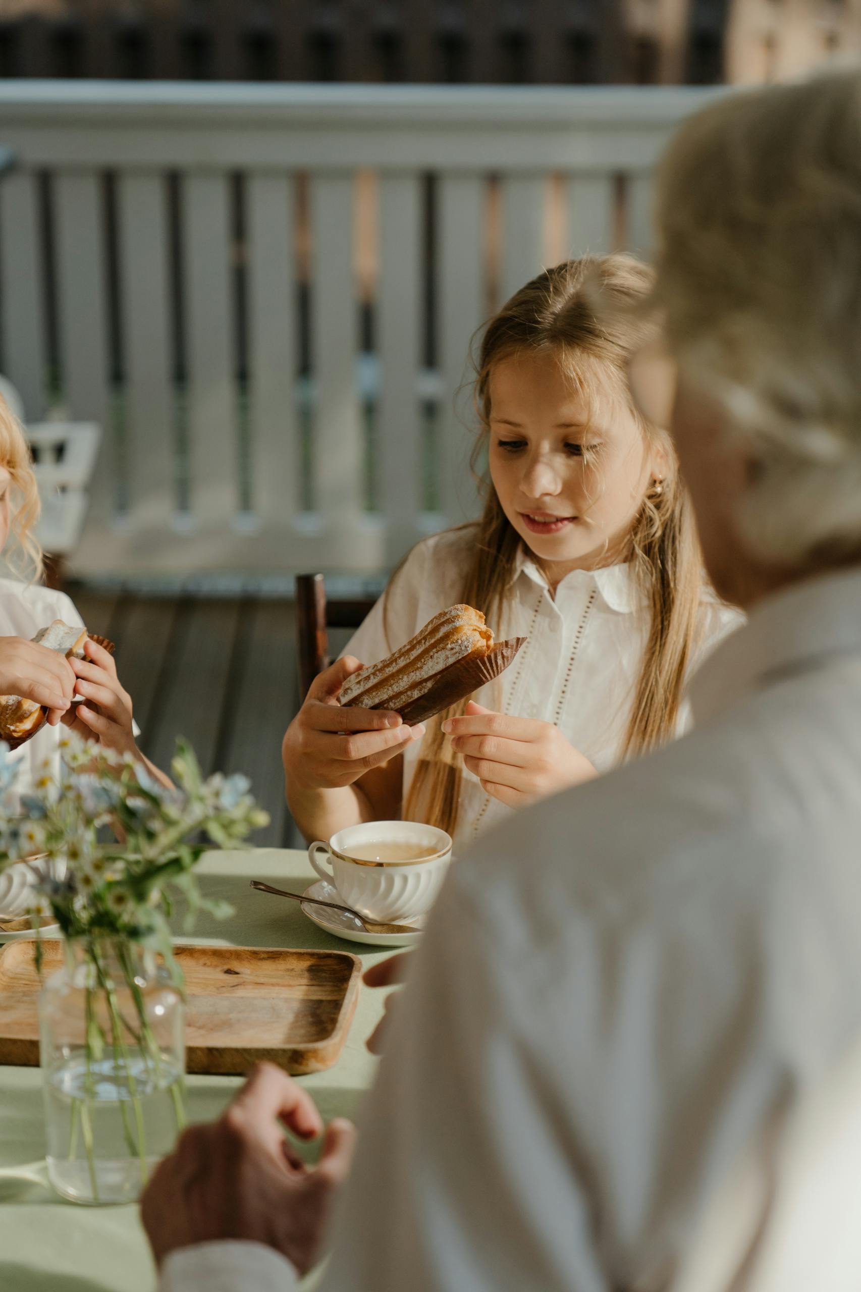 Young Girl Eating a Bread